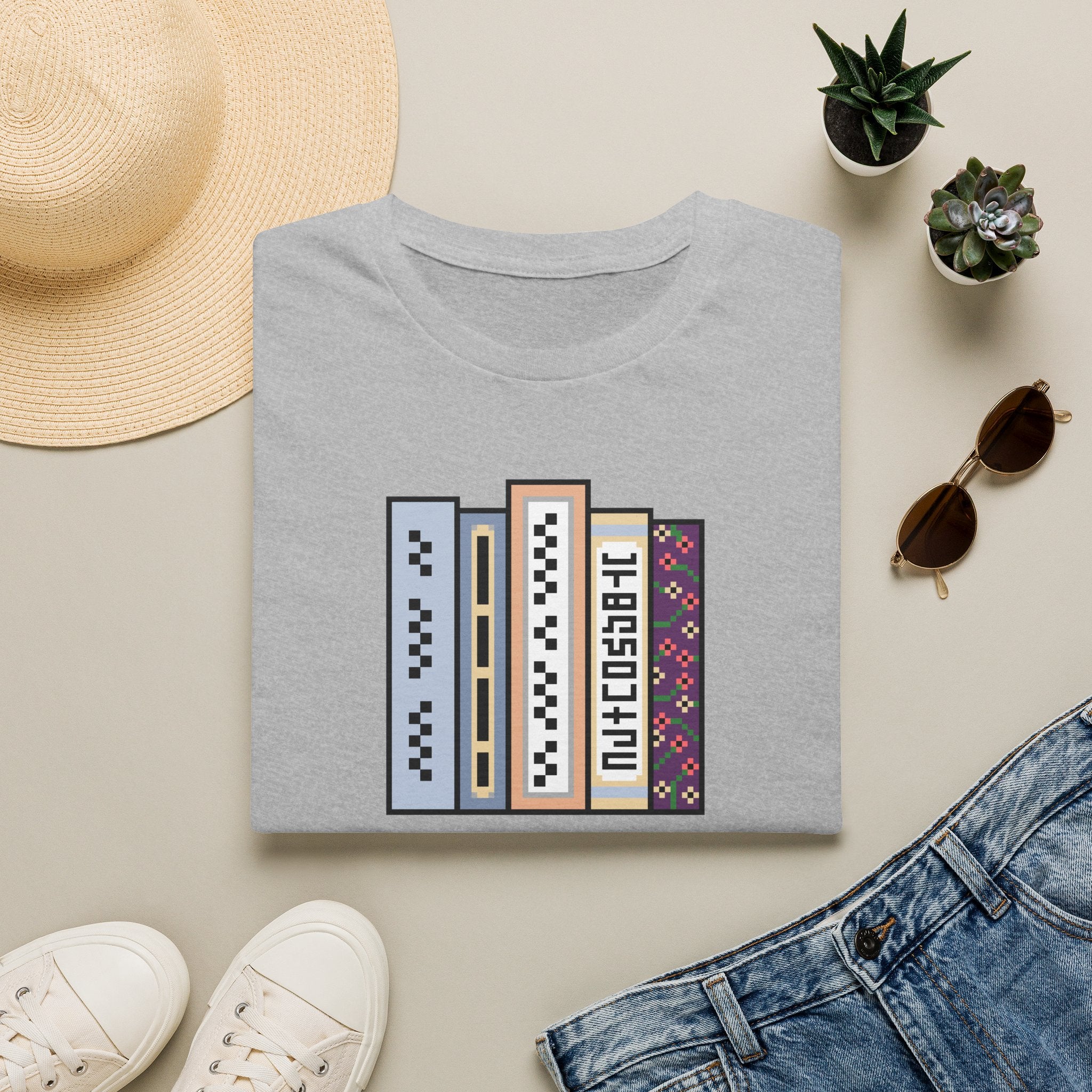 Vintage Bookshelf Tee — Retro Pixel Book Stack Graphic Shirt